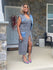 Sweater and denim dress with a high split