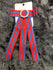 Red and blue ribbon pin