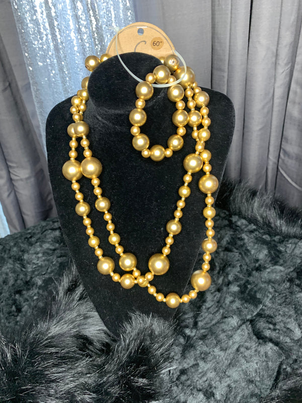 Pearl necklace, bracelet and, earrings set